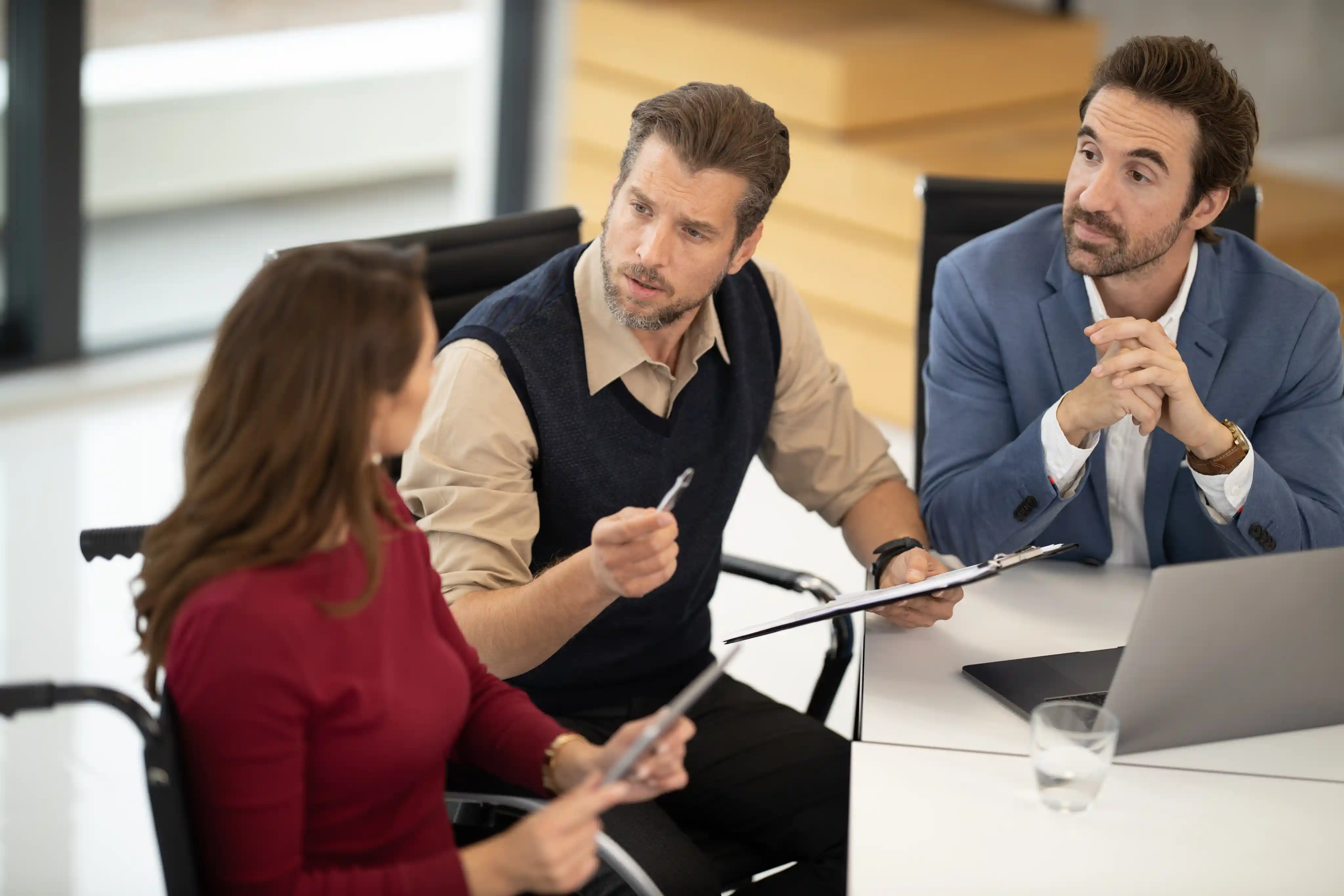 Advisor meeting a client across a desk
